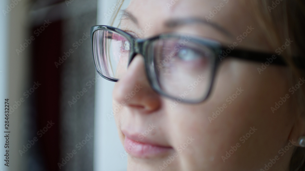 Shot close-up of glasses on a beautiful woman with blurred face Shot close-up of glasses on a beautiful woman with blurred face