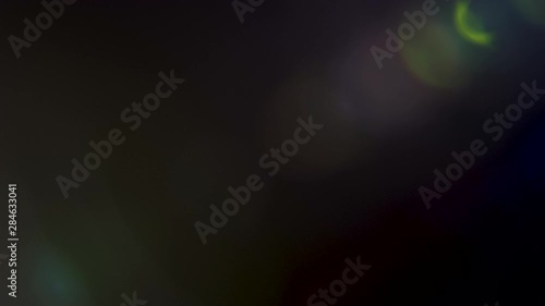 Beautiful organically captured lens flares over black background. Light leaks