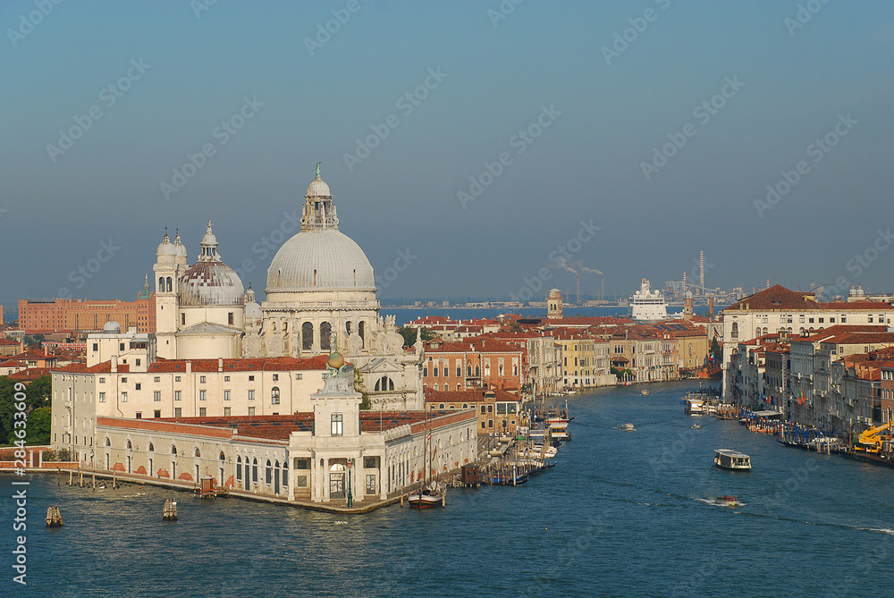 Venice, Italy: Basilica di Santa Maria della Salute und Punta della Dogana, Grand Canal. In the morning sun