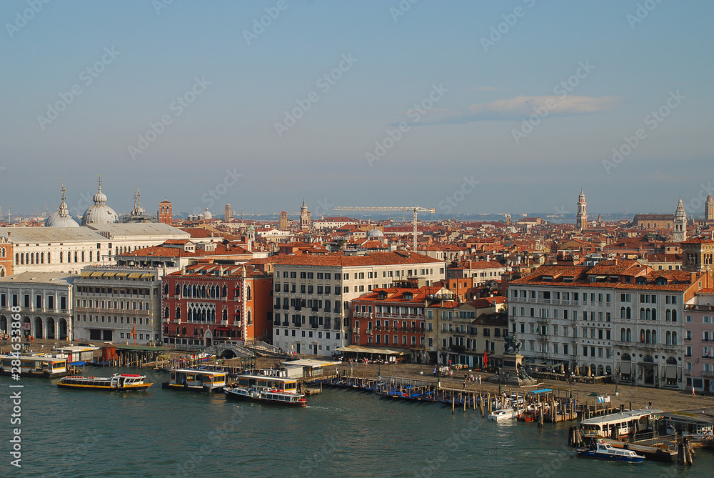 The Riva degli Schiavoni, a waterfront in Venice, Italy. In the morning sun