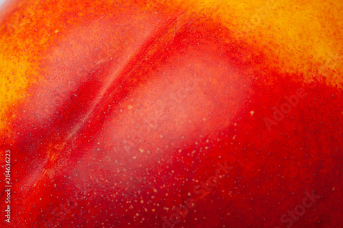 Close up nectarine skin. Fresh organic peaches. Fruit peaches background.