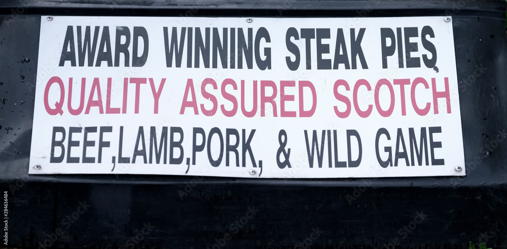 Fototapeta premium Award winning gourmet steak wild game pies butcher food sign
