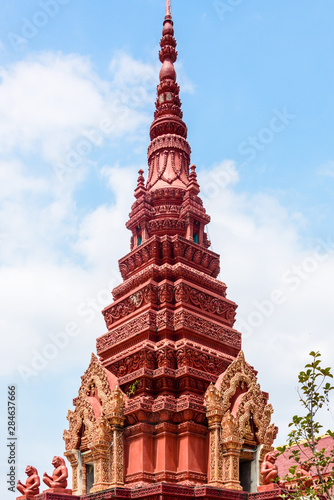 Stupa, traditional Buddhist burial gravestones at a temple in a rural area of Cambodia photo