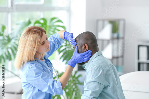 African-American man meetin...