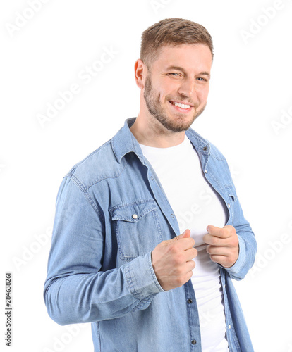Handsome young man on white...