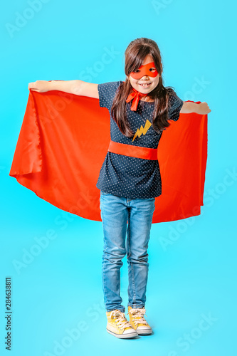 Cute little girl dressed as...