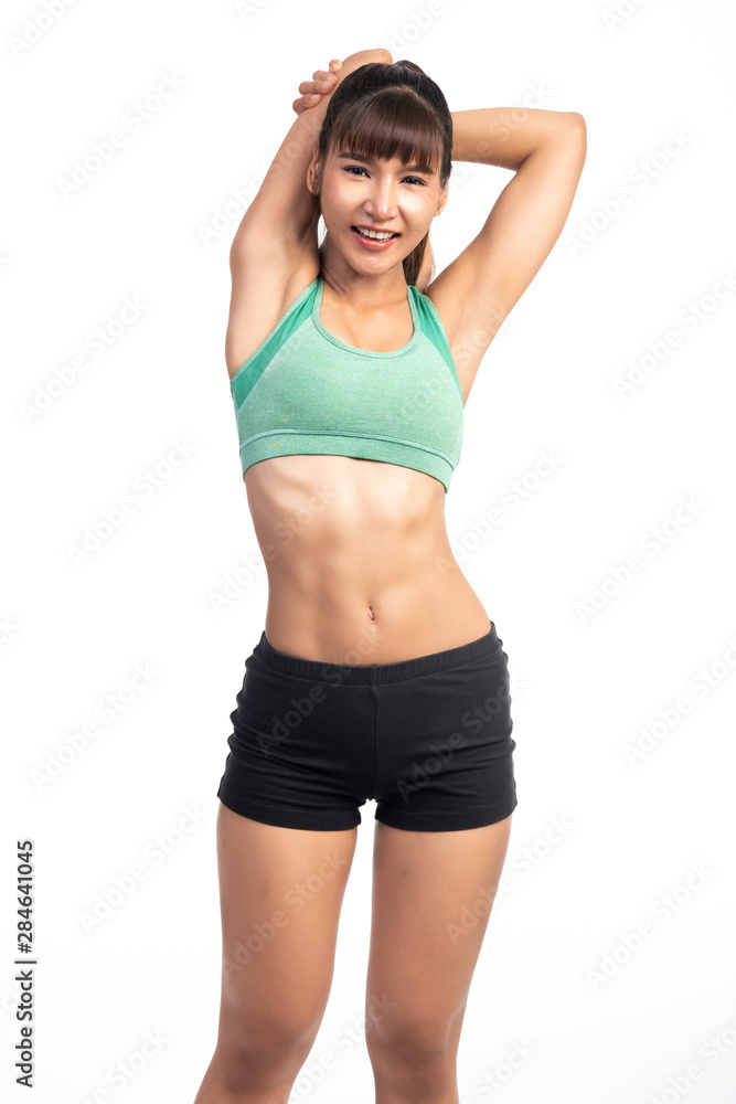 Fitness woman warming up isolated on white background. Asian lady. Shoulder stretch. Fitness woman warming up isolated on white background. Asian lady. Shoulder stretch.