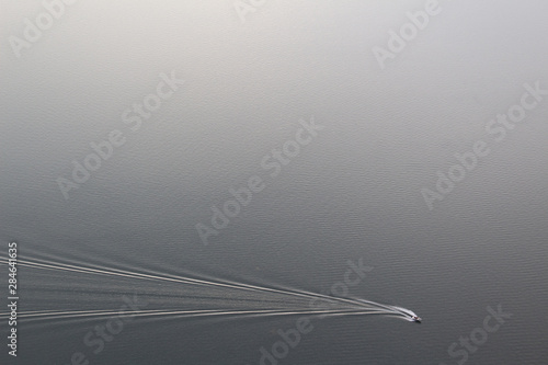 boat motion on lake grey water surface 