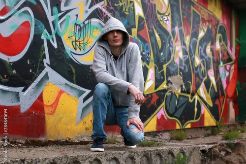 a young man in a hoodie hip-hop
