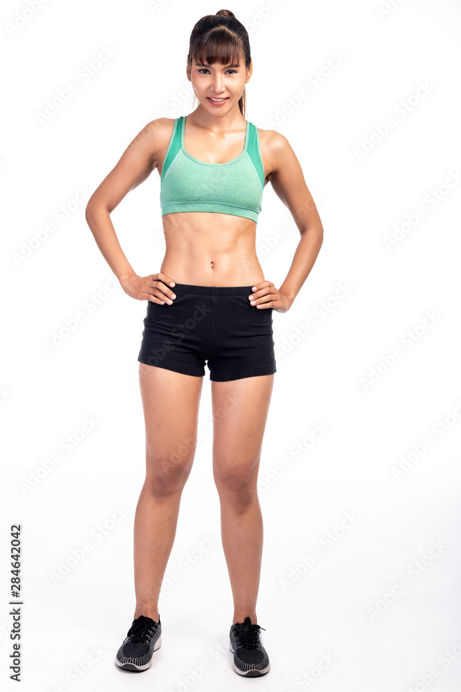 Fitness woman isolated in white background. Asian girl in full body pose. Happy smile. Fitness woman isolated in white background. Asian girl in full body pose. Happy smile.