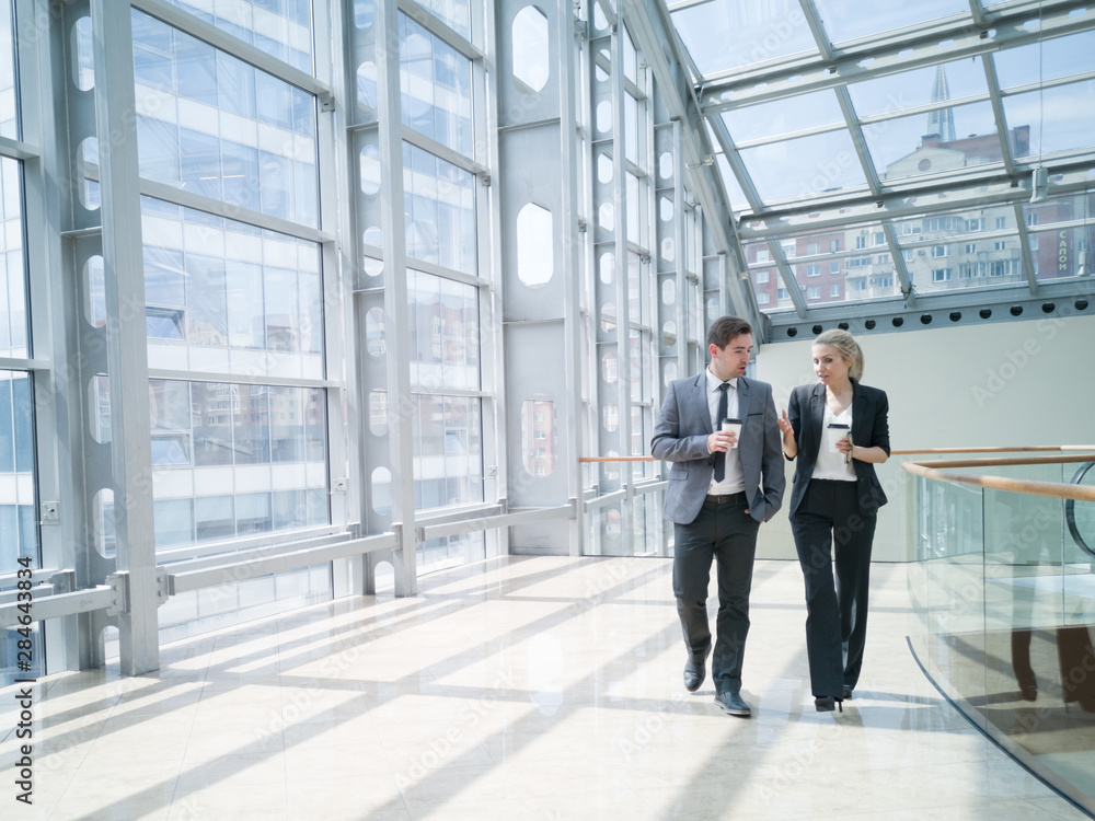 Business people walk together Business people walk together