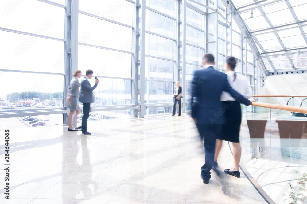 Business people walking in hall