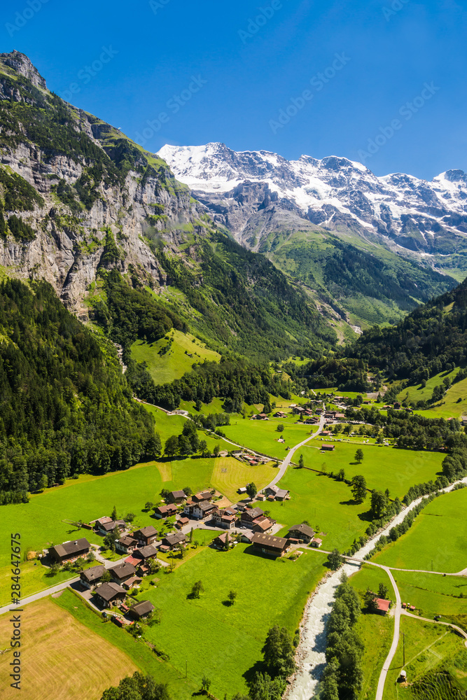 Aerial view of lauterbrunnen Valley and Jungfrau swiss alps behind, Switzerland.