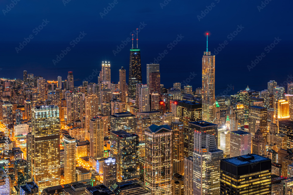 Naklejka premium Aerial view of Chicago cityscape skyscraper under the blue sky at beautiful twilight time in Chicago, Illinois, United States, Landscape and Modern Architecture concept