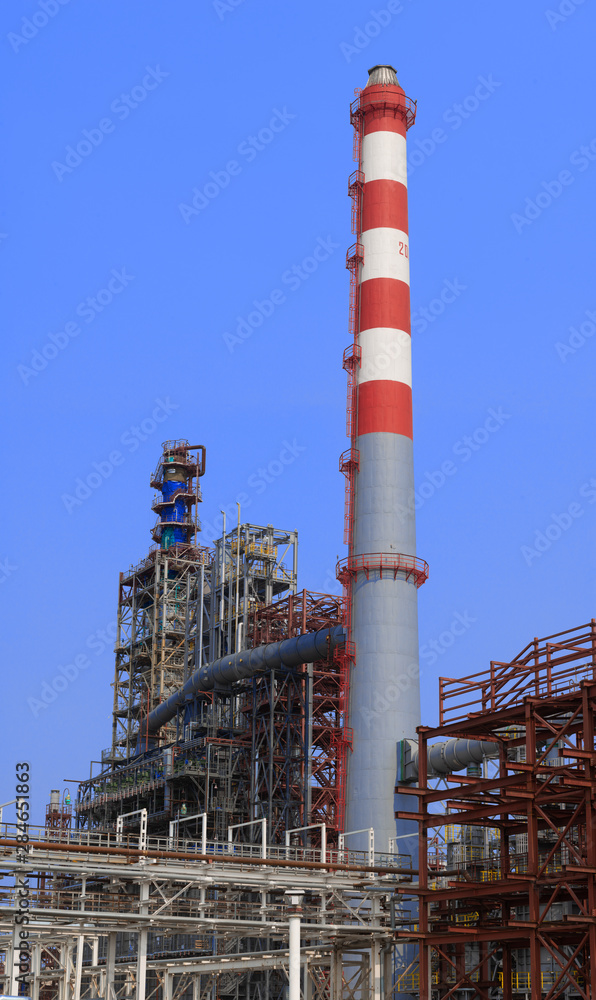 view of metal pipes of industrial plant outdoor at sunny day view of metal pipes of industrial plant outdoor at sunny day