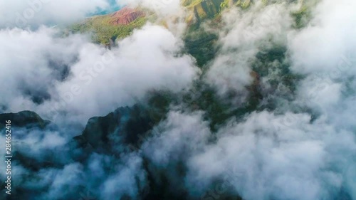 Aerial shot of the cliff mountain and the sea in Na Pali coast in Kauai Hawaii