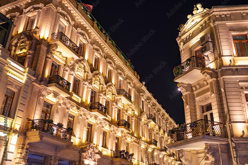 Old architectural houses in Baku city at night