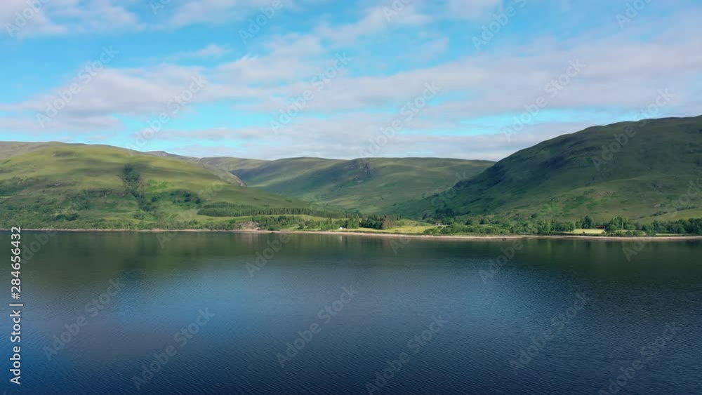 Aerial view of Loch Eil/Linnhe situated in landscape of Scottish Highlands, lush green hills and deep lake - panorama of Highlands of Scotland from above, United Kingdom, Great Britain, Europe Aerial view of Loch Eil/Linnhe situated in landscape of Scottish Highlands, lush green hills and deep lake - panorama of Highlands of Scotland from above, United Kingdom, Great Britain, Europe