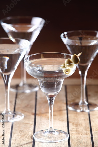 The martini is a cocktail made with gin and vermouth, and garnished with an olive or a lemon twist. Over the years, the martini has become one of the best-known mixed alcoholic beverages.
