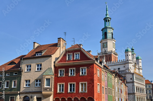 Old market square with historic tenement houses and a Renaissance town hall in Poznan.