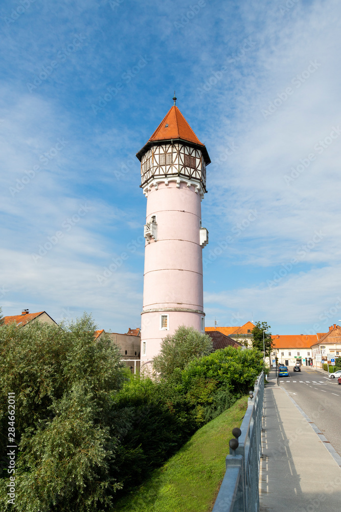 Brezice, Slovenia, 02/08/2019 Ancient Brezice water tower. The tower water tank was built in 1914 for the needs of the city's aqueduct. The tower is 46 meters high.