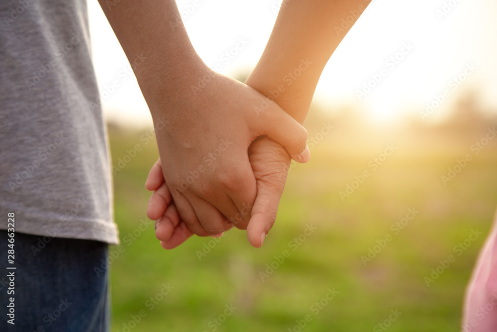 Couple holding hands Couple holding hands