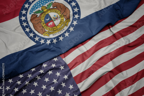 Wallpaper Mural waving colorful flag of united states of america and flag of missouri state. Torontodigital.ca