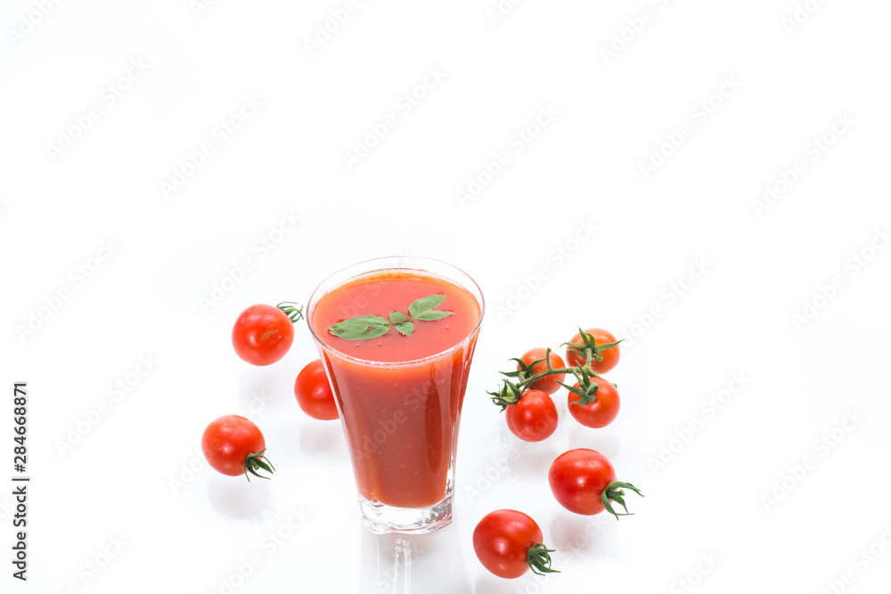 homemade tomato juice in a glass and fresh tomatoes homemade tomato juice in a glass and fresh tomatoes