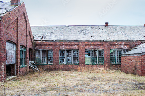 old decaying brick building details photo