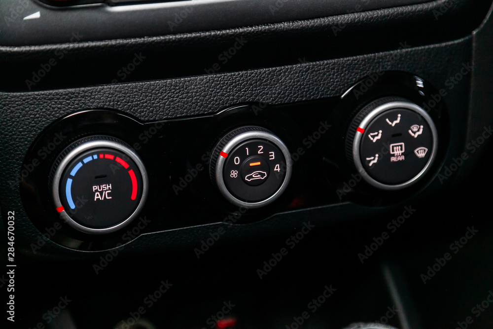Close up car ventilation system and air conditioning - details and controls of modern car..