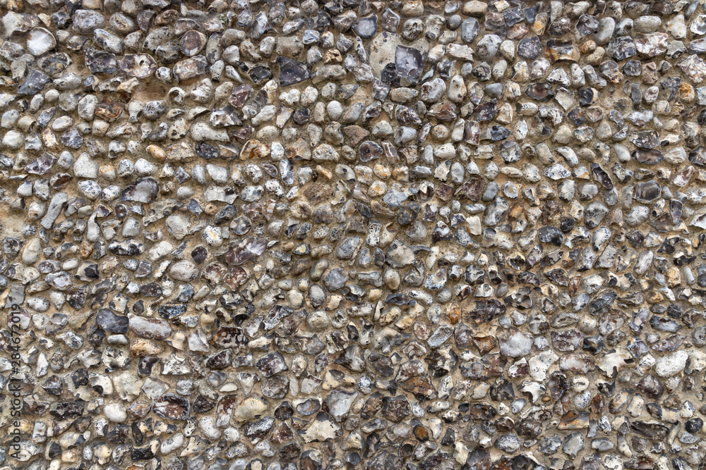 Pebble flint stone wall texture graphic resource Stock Photo | Adobe Stock
