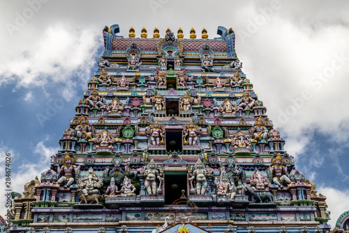 Hindu temple with colorful facade called Arulmihu Navasakti Vinayagar Temple in Victoria on Seychelles island mahé photo
