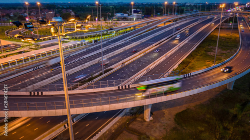 aerial view traffic car transportation freeway motorway and ring road at twilight