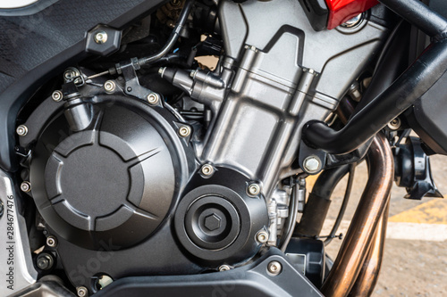 Close up of modern motorcycle engine detail and structure. Select focus © powerbeephoto