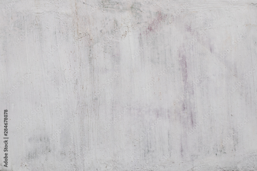 Fototapeta premium The texture of the unevenly painted white paint of the wall of the house. Abstract background for the designer.