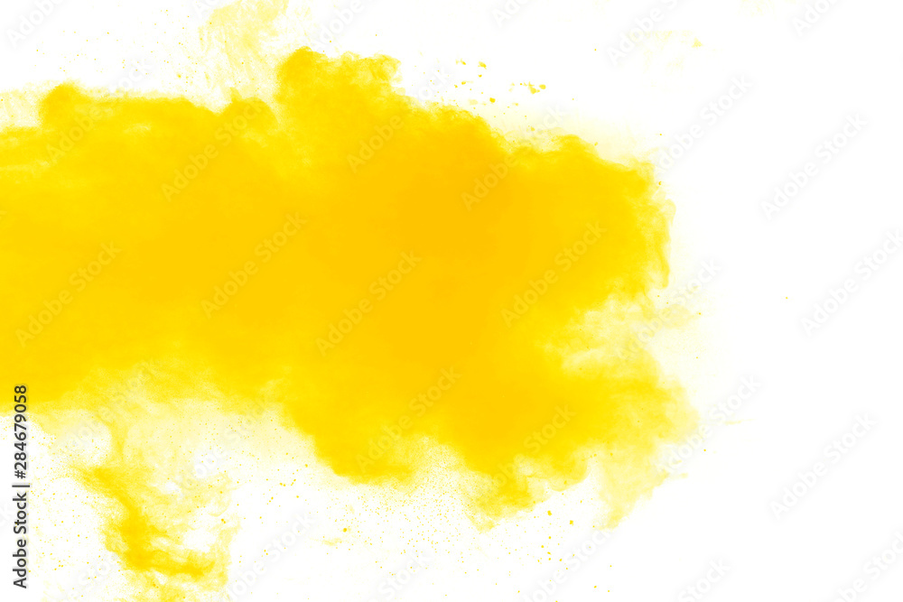 Abstract yellow orange powder explosion on white background. Freeze motion of yellow dust particles splash. Abstract yellow orange powder explosion on white background. Freeze motion of yellow dust particles splash.
