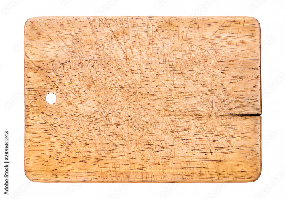 Old wooden cutting board isolated on white Old wooden cutting board isolated on white