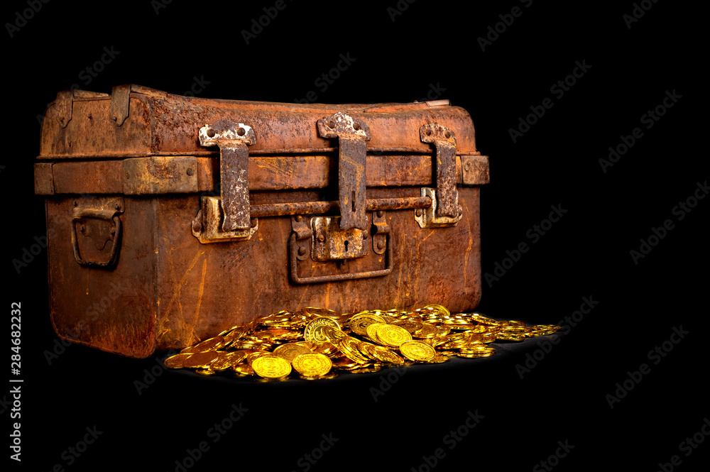 Stacking Gold Coin in treasure chest on black background Stock Photo