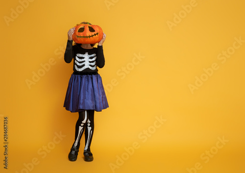 little girl in skeleton costume