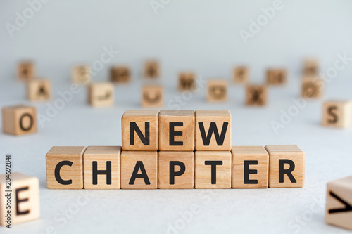 Tableau sur toile new chapter - words from wooden blocks with letters, starting new life new chapt