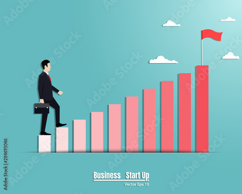 Businessman walking up to on growth chart success