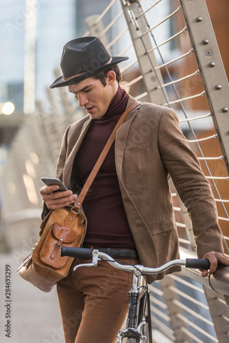 Handome man cycling outdoors