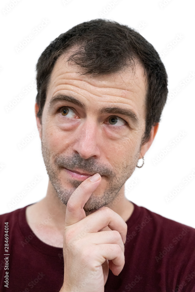 portrait of spanish guy with beard in thinking position