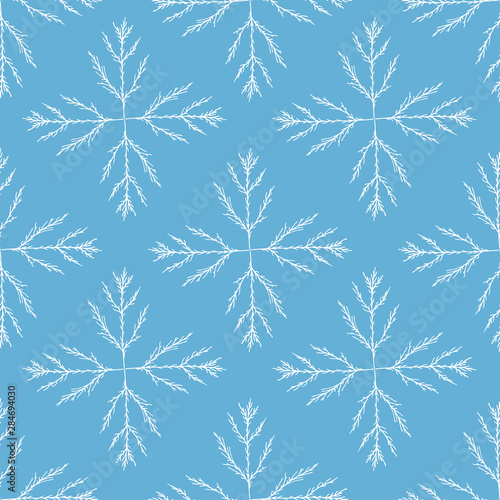 New year seamless pattern. White snowflakes background. Blue vector pattern. Winter snowflakes print for wrapping  textile  wallpaper design.