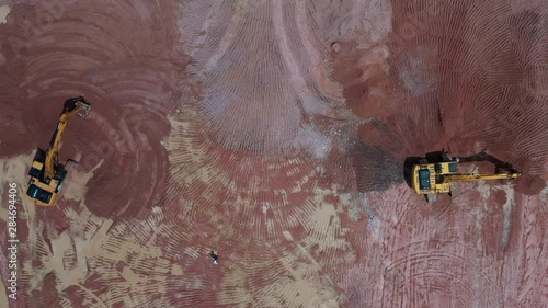 Aerial view excavator working on a construction site. photo