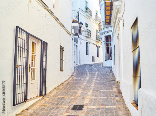 A typical street of whitewashed walls of Vejer de la Frontera downtown. View from the Jose Castrillon street. Cadiz province, Andalusia, Spain. © Álvaro Germán Vilela