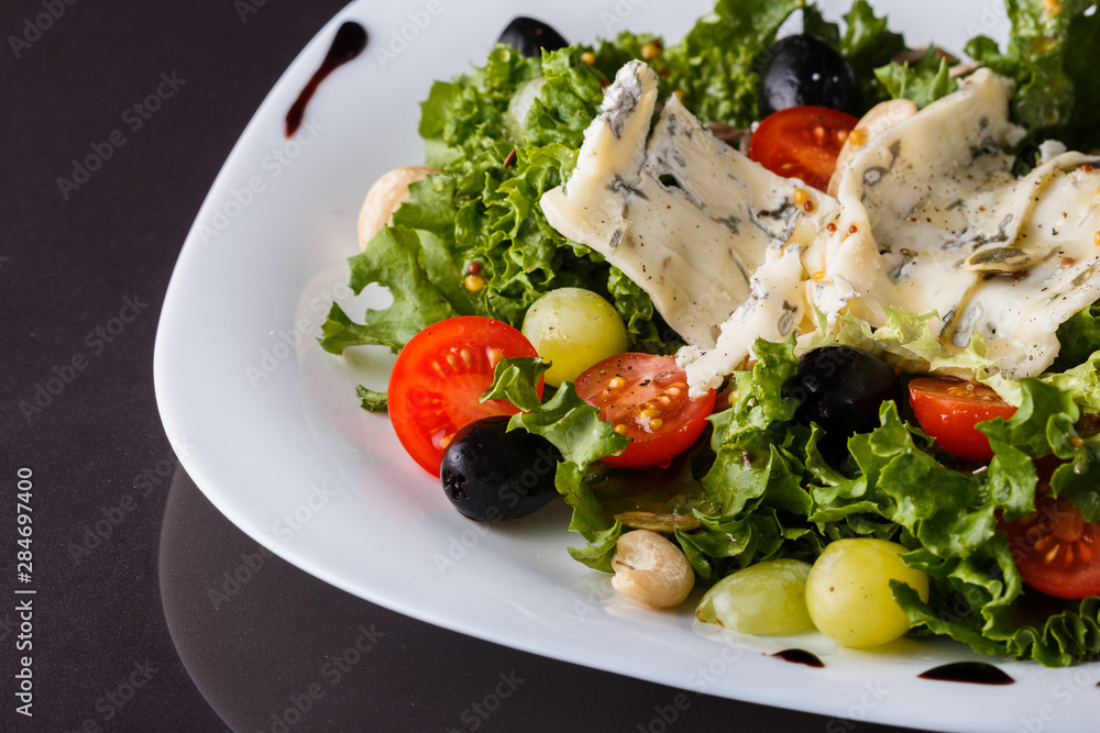 Salad provence. Mix lettuce tomato grape olive and blue cheese Salad provence. Mix lettuce tomato grape olive and blue cheese
