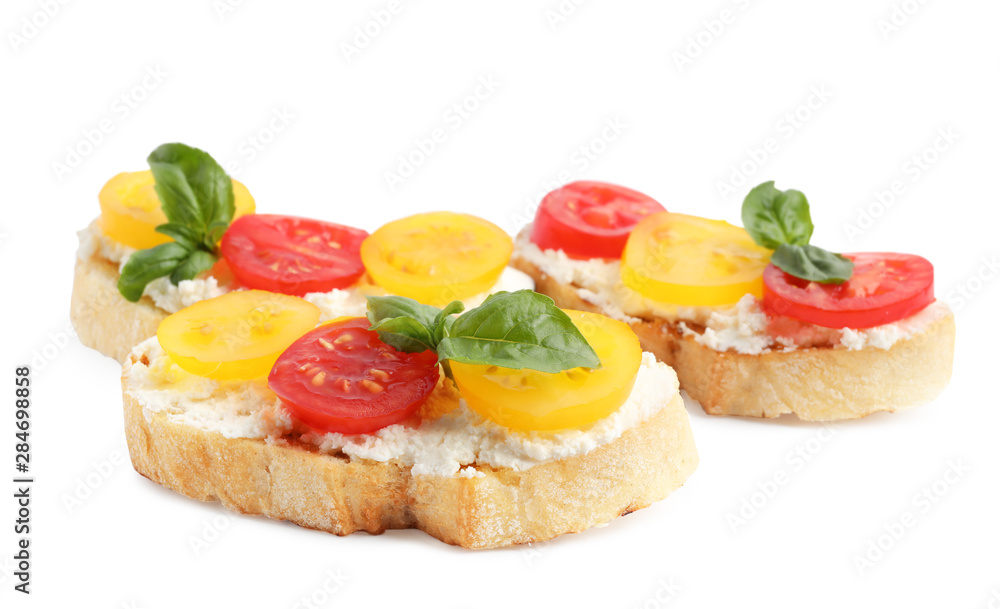 Tasty fresh tomato bruschettas on white background Tasty fresh tomato bruschettas on white background