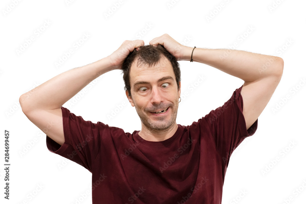 Fototapeta premium Portrait of a crazy man grab his hair with smile