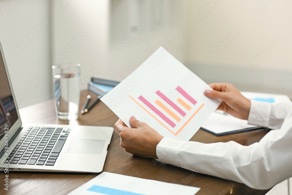Business trainer working at table in office, closeup Business trainer working at table in office, closeup